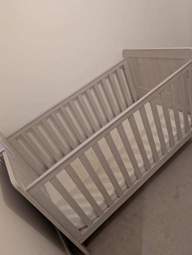 Cot with nightlight and mattress - excellent condition - can deliver free