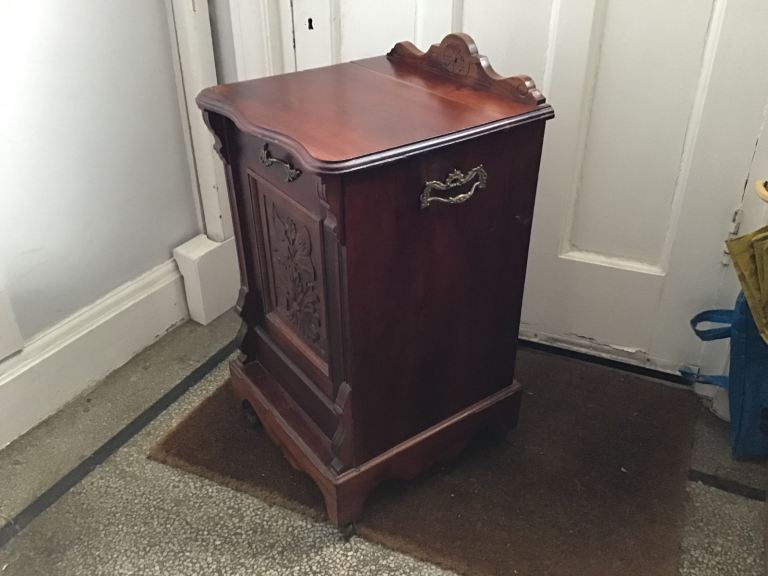 Wooden coal scuttle with casters
