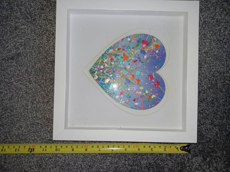 Heart shaped picture in a frame 