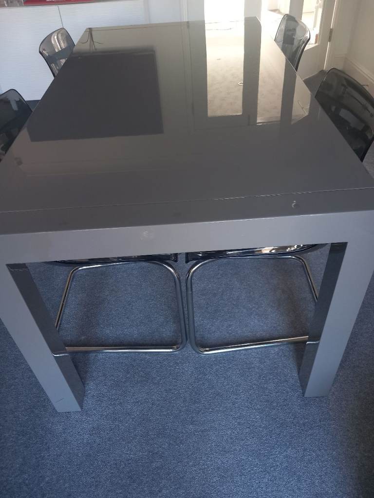 Grey Gloos Dining Table and Console table and 4 Smoked Grey Chairs – Good Condition