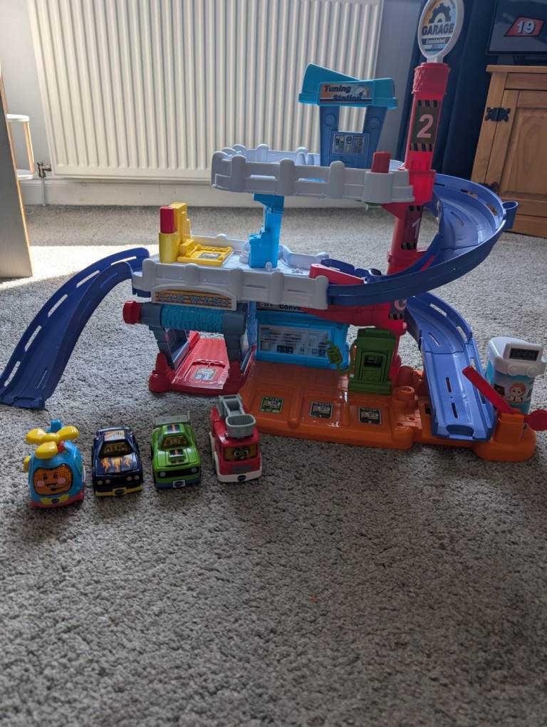 Kids Multi-Level Toy Garage with Cars – Good Condition