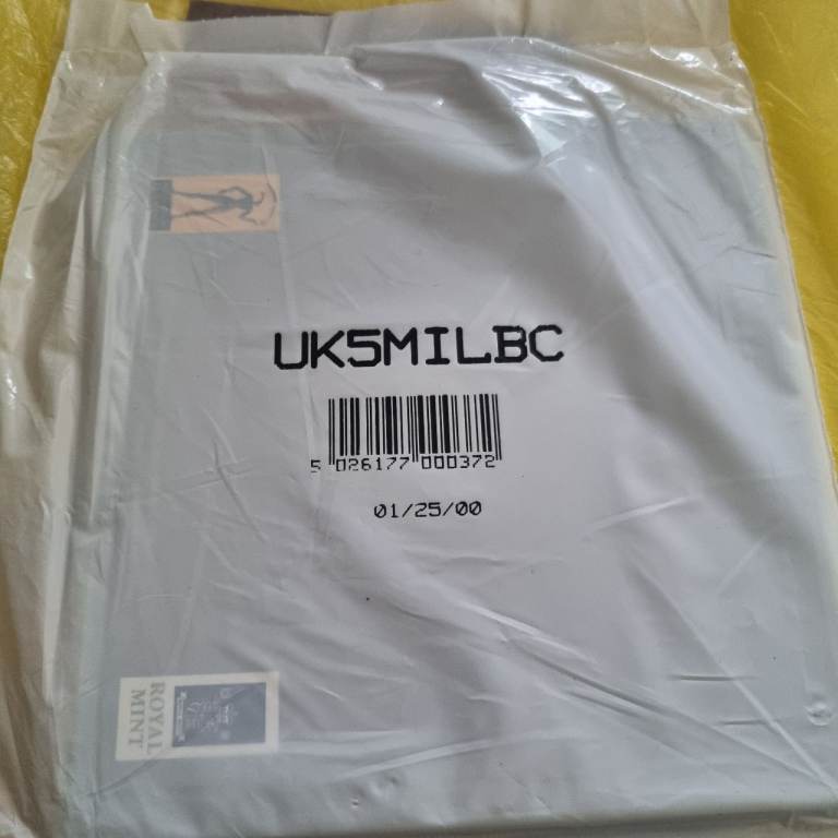 £5 Millenium Coin sealed 