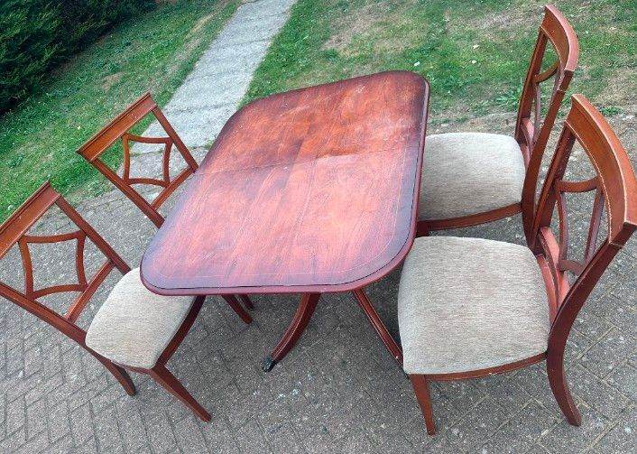 Excellent wooden Dining table with 4 solid chairs for £85