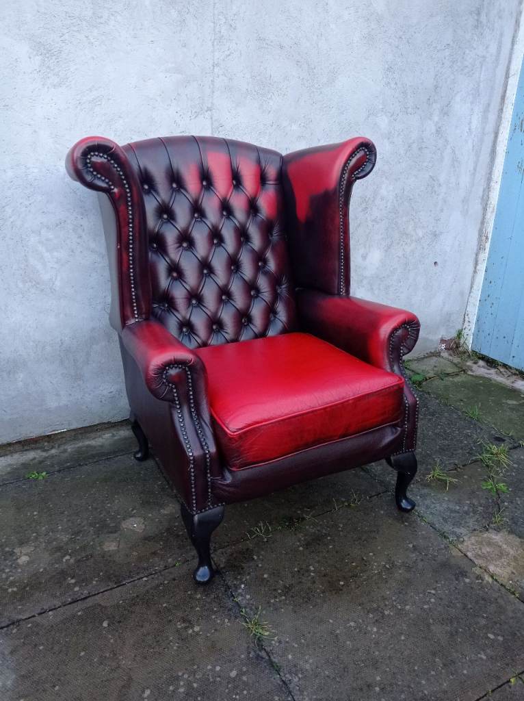 A Red Leather Chesterfield Queen Ann/Wing ArmChair