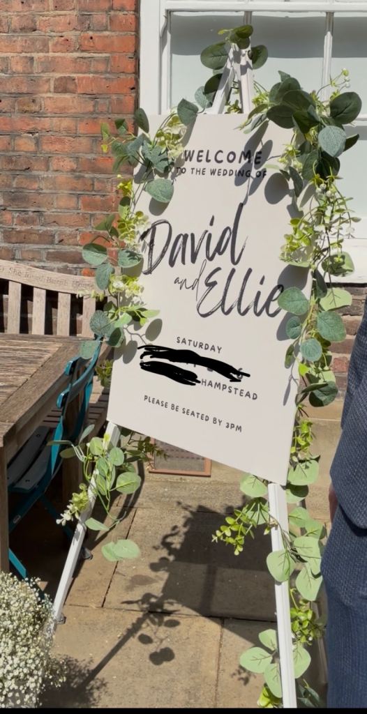 White easel good for art or wedding
