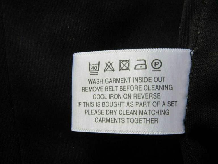 Dress in geometric square pattern in black and grey by Country Casuals.