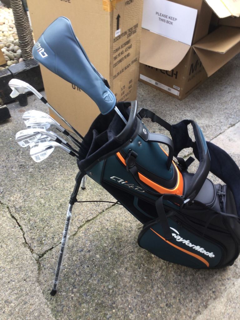 New Taylormade driver and irons and Taylor stand bag 