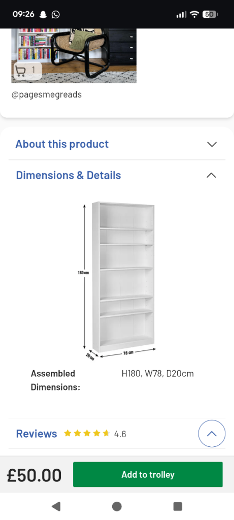 Two tall white bookcases