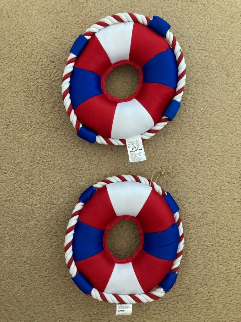 Two new unused outdoor dog toys