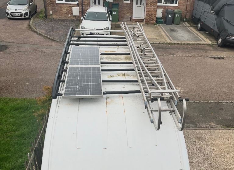 RHINO ROOF RACK 1 year old w Solar panels