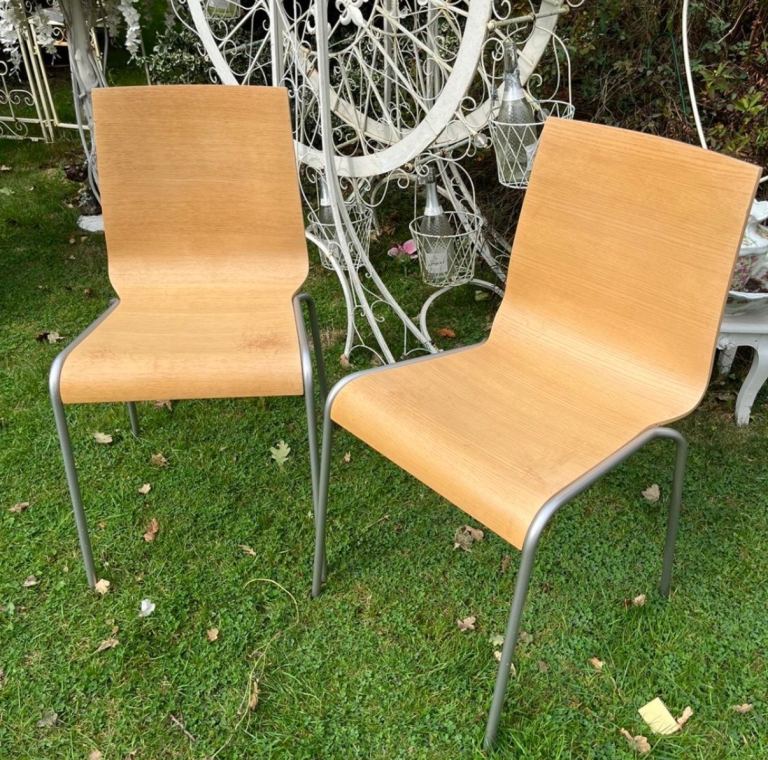 A Pair of Stacking Chairs by Italian company Calligaris  