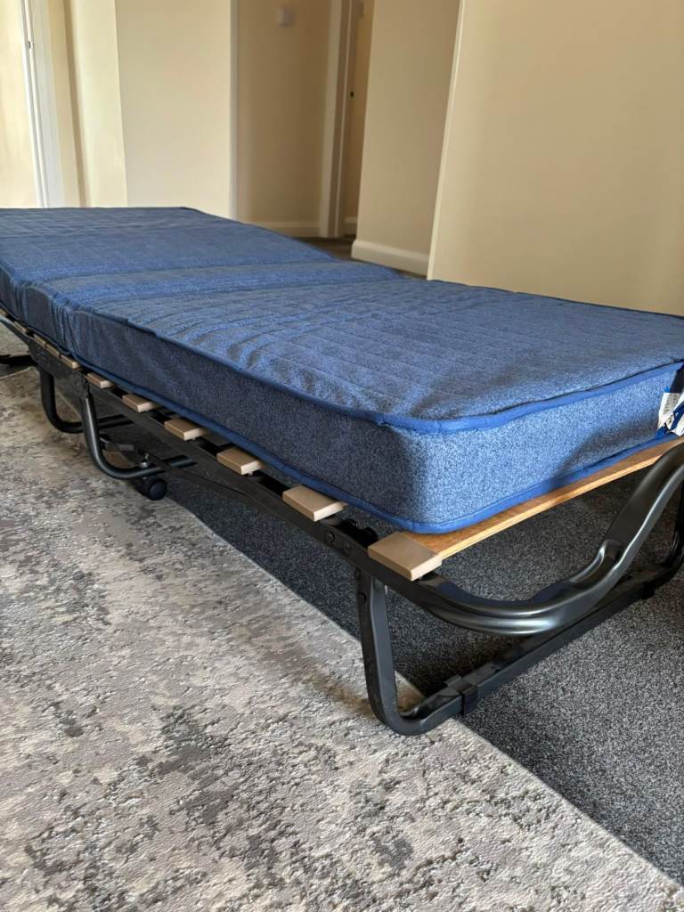 Folding guest bed