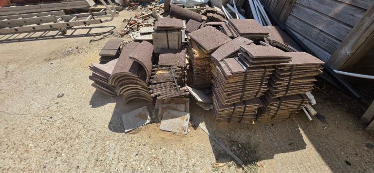 Mixed Roof Tiles and Building Materials – Fair Condition