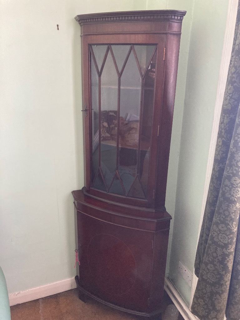 Period style corner drinks cabinet can deliver