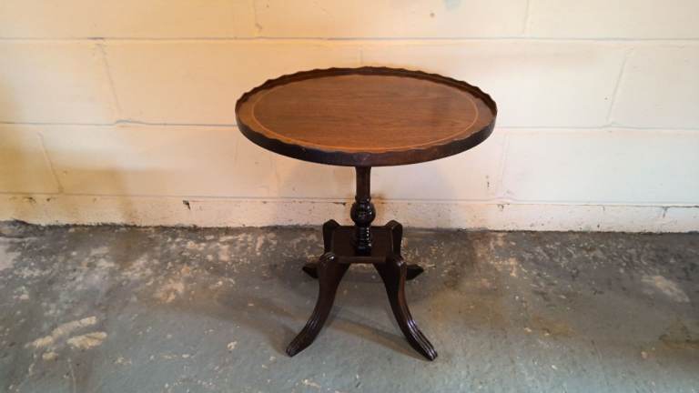 round side table end table finished in mahogany