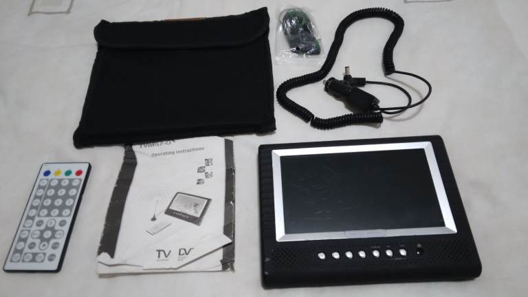 £15 - 7inch Digital TV - NextBase - Mains or 12Volt with remote control, case and earplugs.  