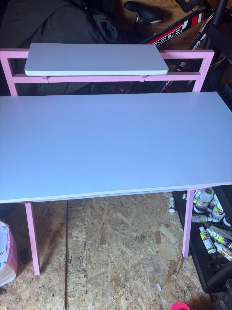 White and pink gaming desk 