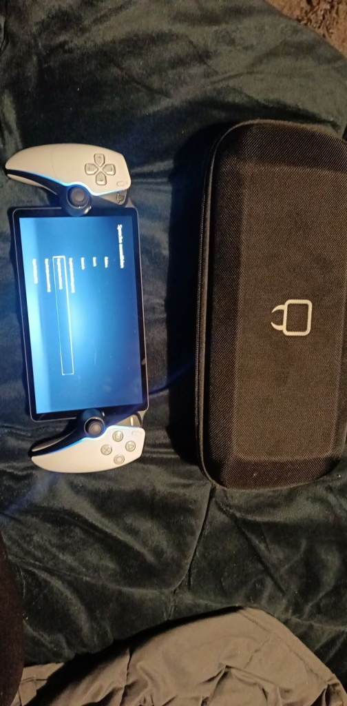 image for playstation portal immaculate with case and spare screen protector