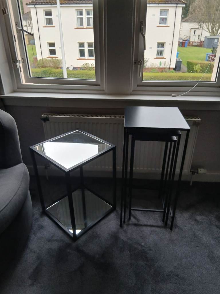 Side table and a nest of tables.