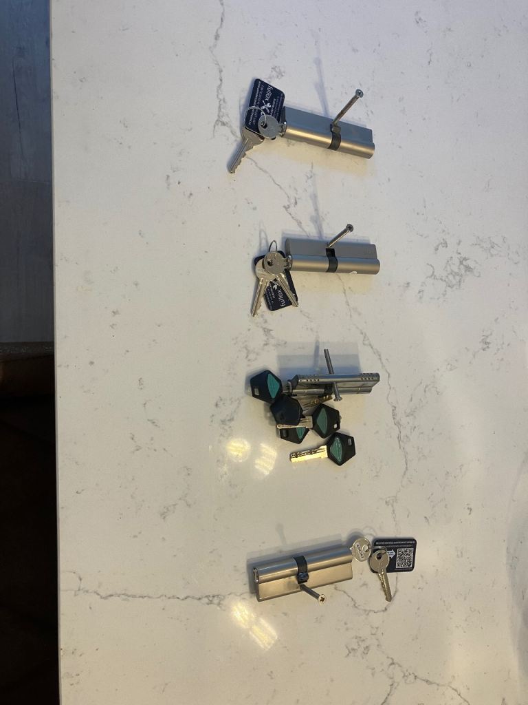 Four locks with keys for UPVC doors. 