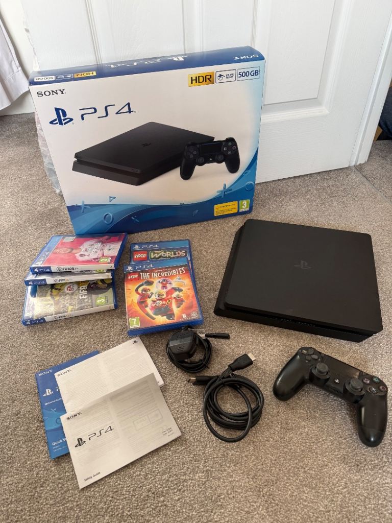 PlayStation 4 Boxed as new. With games 
