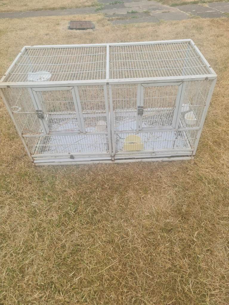 Nice steel bird cage used as one or 2 with trays 