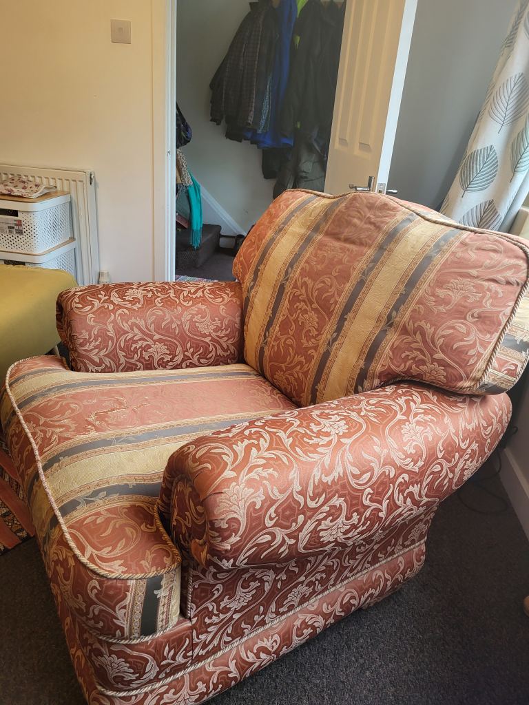 Comfy oranged patterned sofa chair