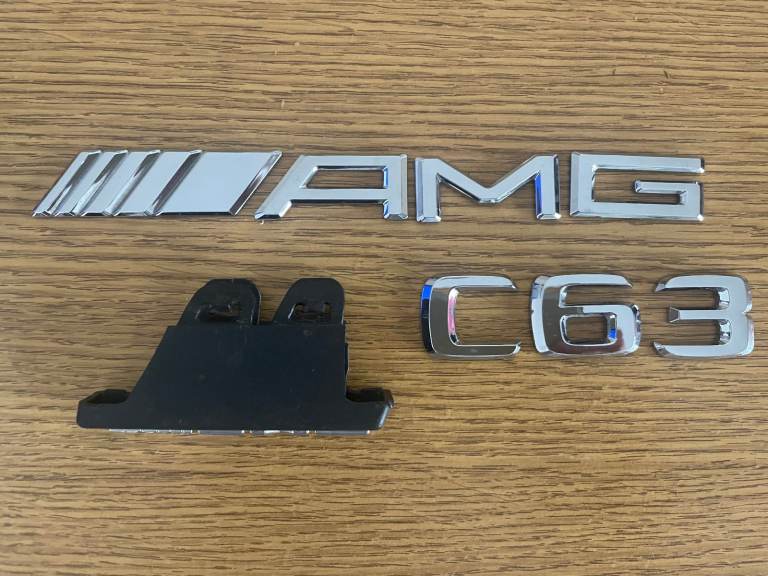 USED Mercedes AMG C63 FRONT GRILL BADGE AND BOOT BADGES