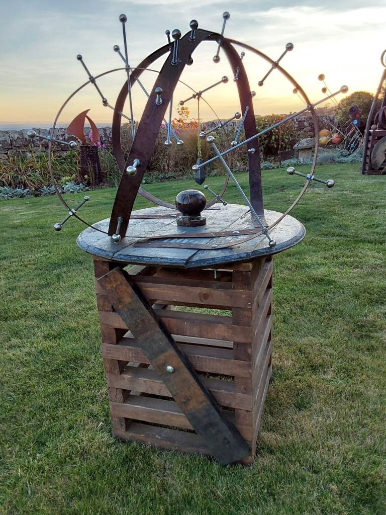 Rustic garden art from recycled whisky barrel materials 