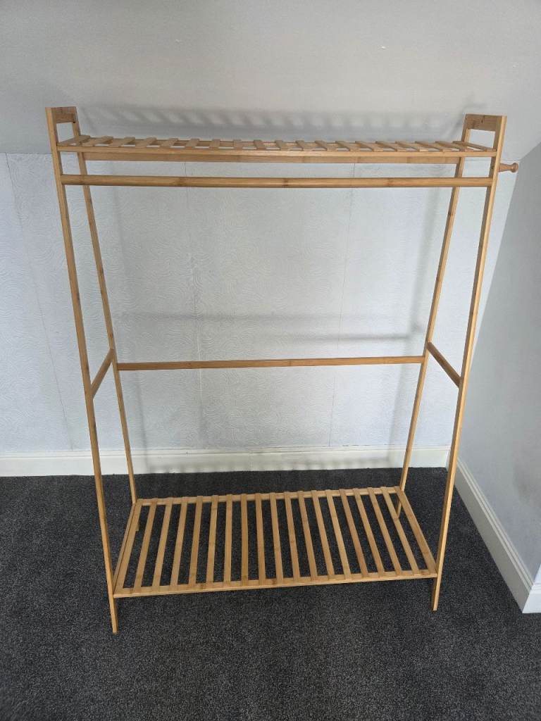 Wooden wardrobe clothes rail