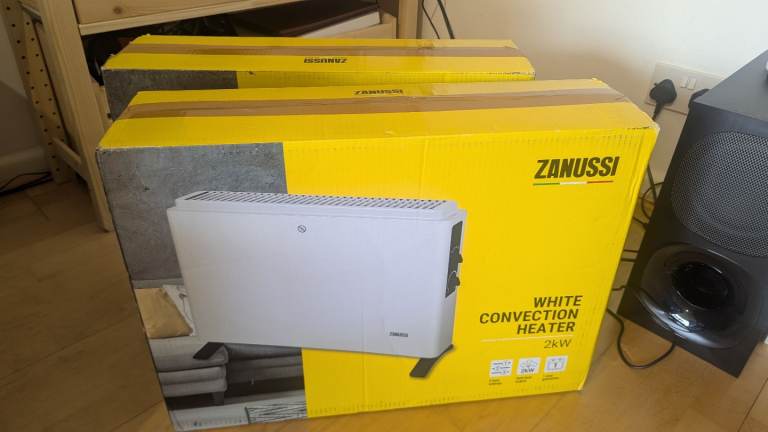 2 white zanussi convection heaters