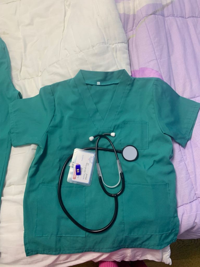 Green Medical Scrubs Set with Stethoscope and Cap – Good Condition