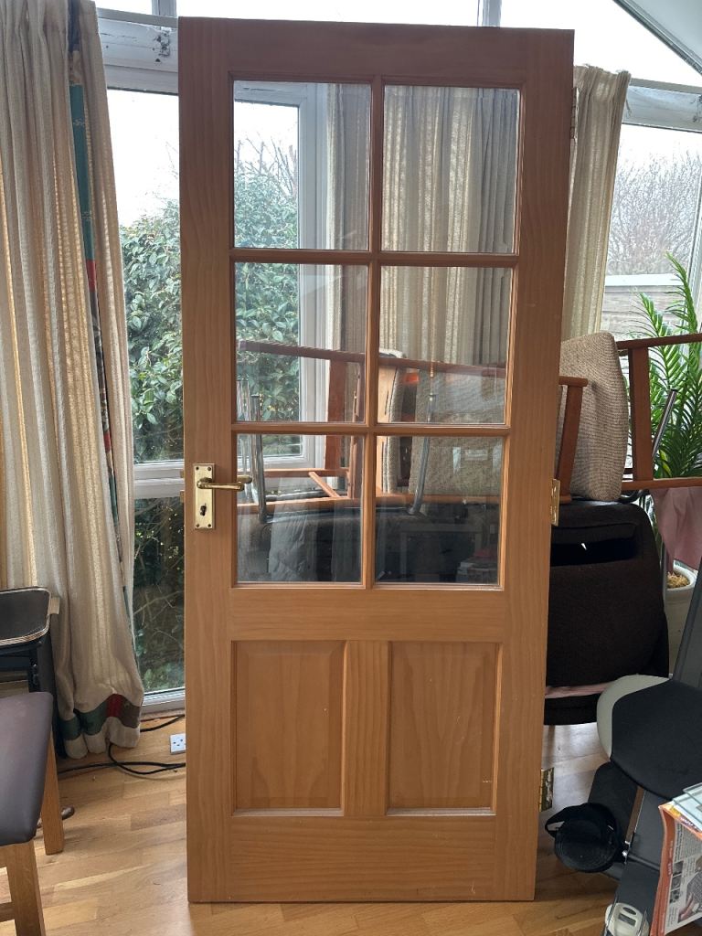 Solid oak glass panelled internal door 