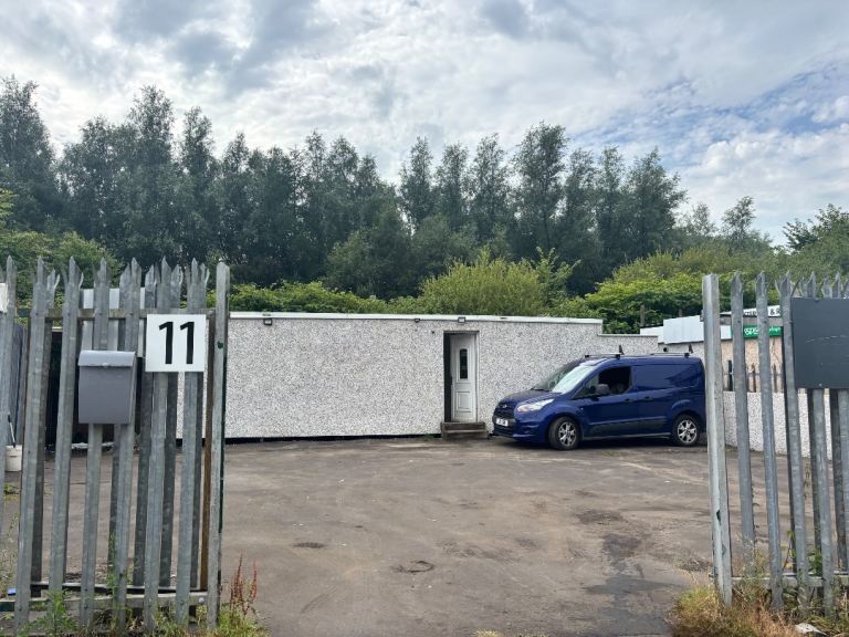 Yard area with storage porta cabin/office space 