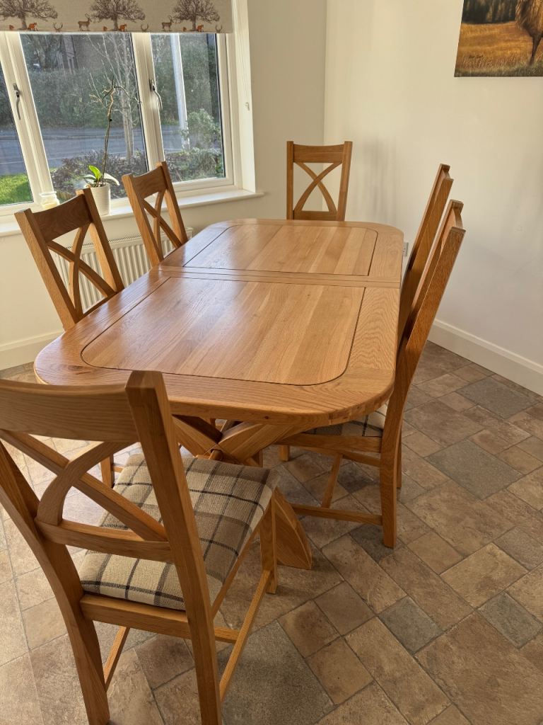 Oak dining table and chairs