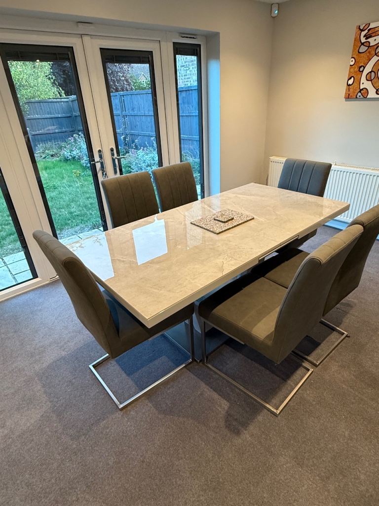 image for Extendable Dining Table with 6 chairs