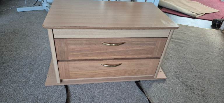 Centre drawer with folding table and bed slats.