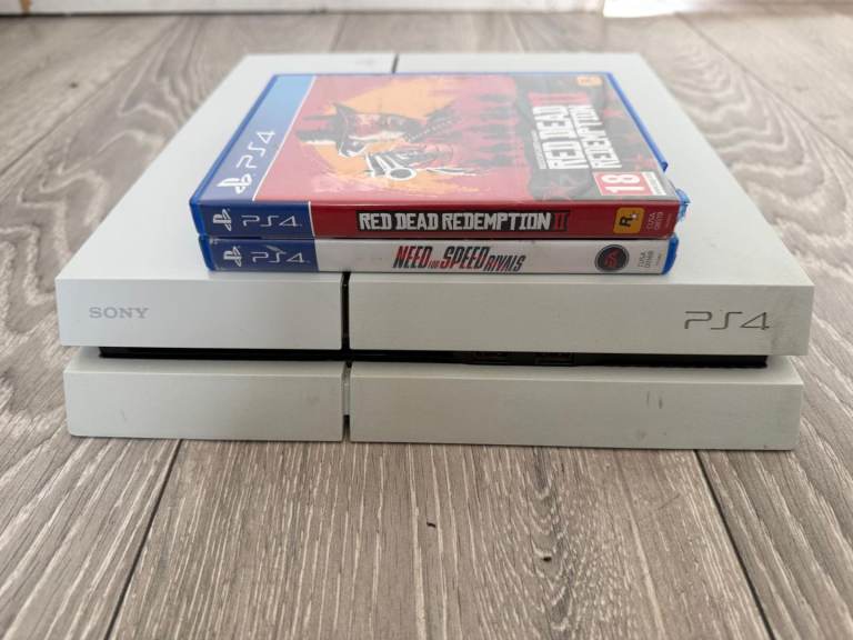 PlayStation 4 500GB White with Need for speed rivals and Red Dead Redemption 2