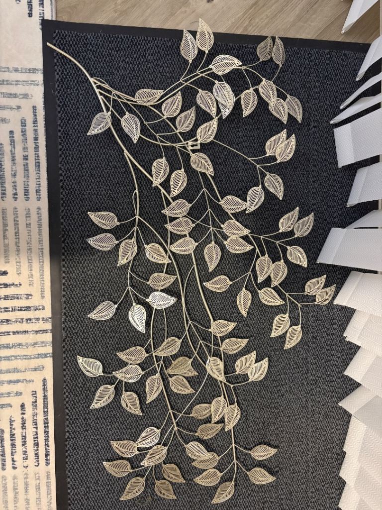 Silver metal flower wall art