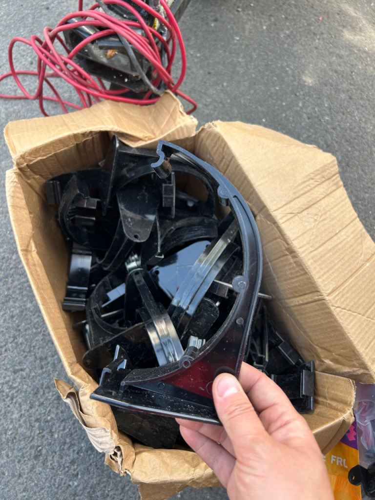 Box of Black Gutter Brackets - Good Condition