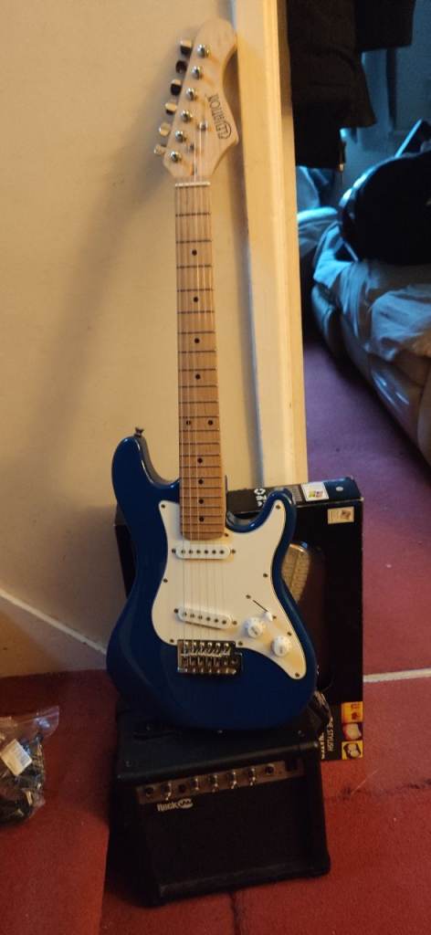 Elevation 1/2 size electric guitar and amp For 5 to 8 year olds.
