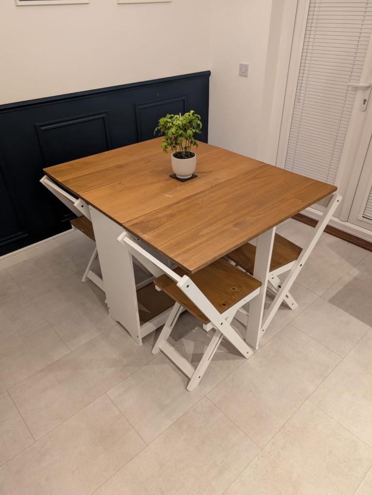 image for Foldable dining table with x4 chairs