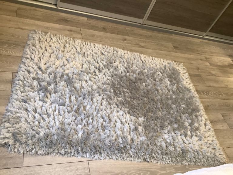 Two Large Rugs