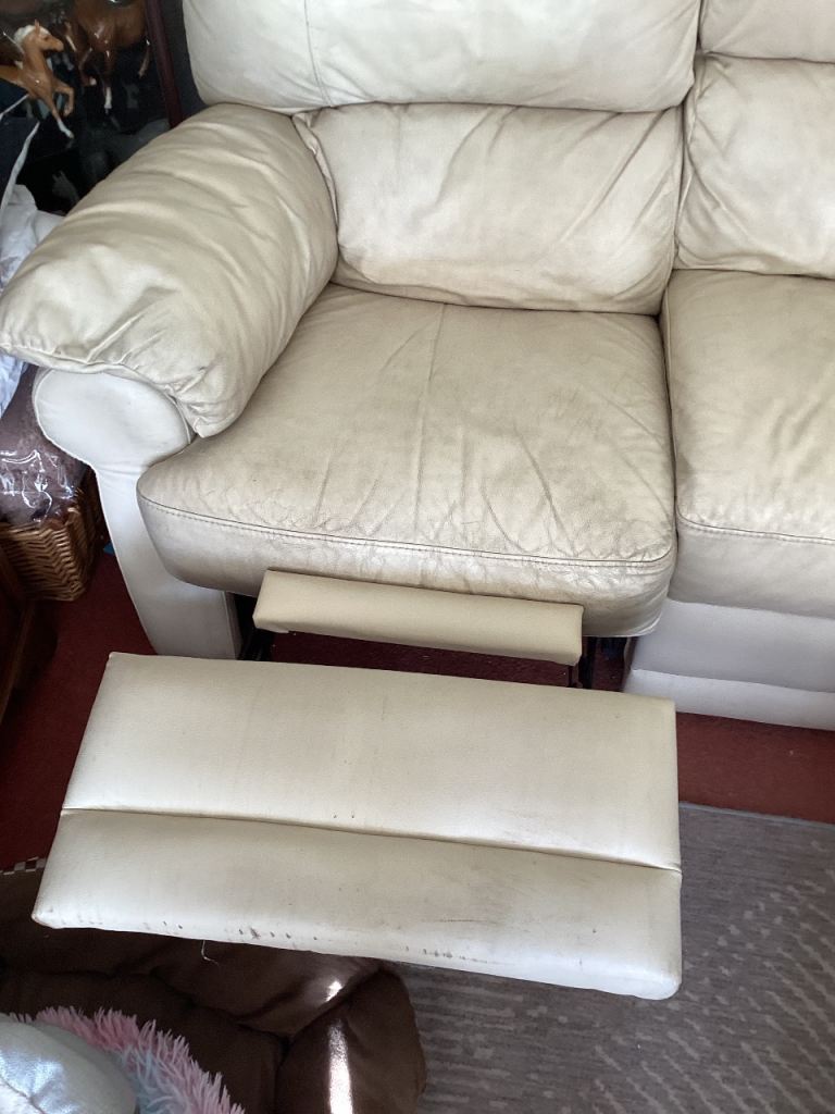 Cream three seater sofa 