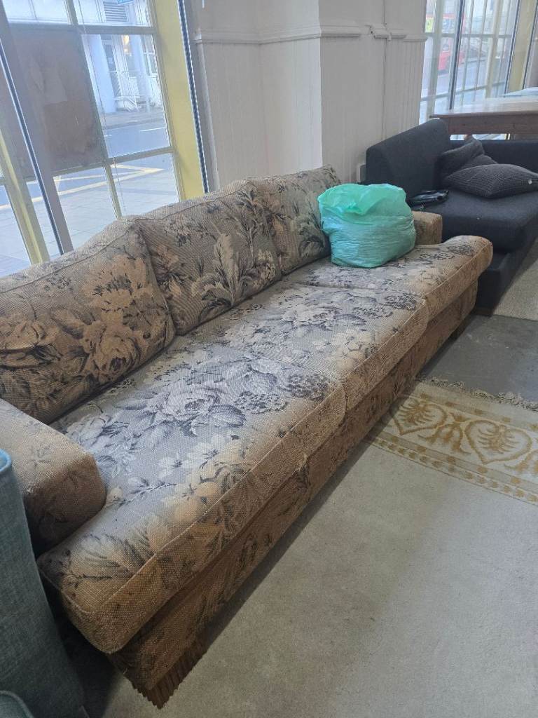 3 seater light brown sofa.