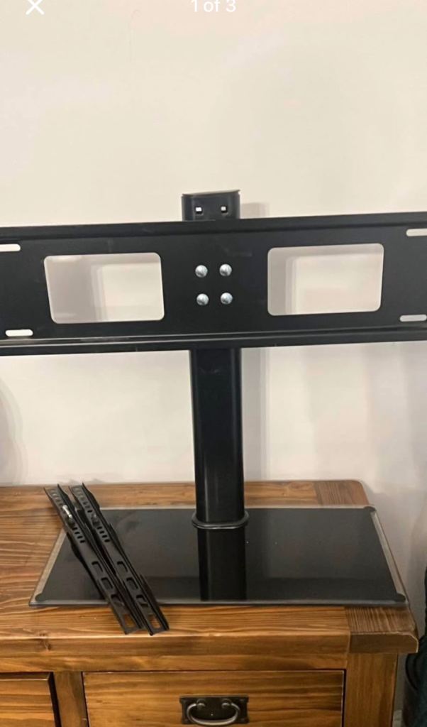 Wall bracket and tv table top stand. 