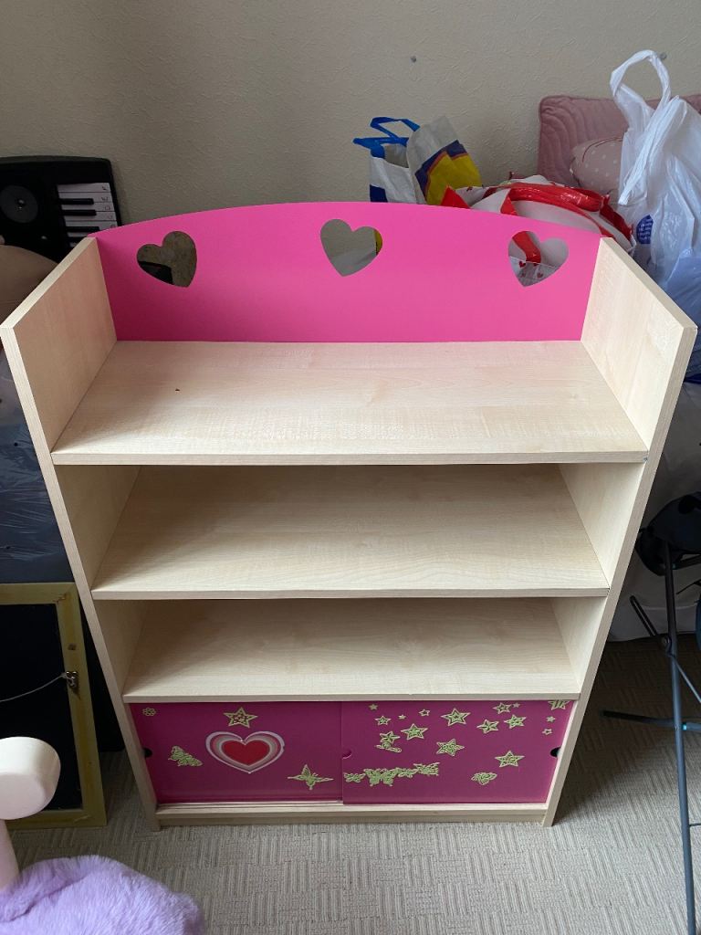 Kids book shelf with sliding door 