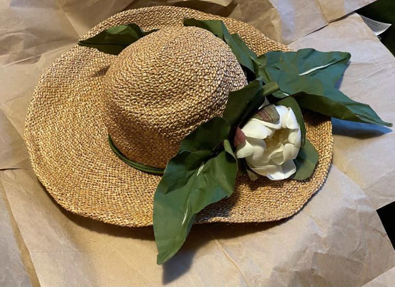 Vintage 60s Fortnum & Mason Otto Lucas straw sun hat with white flower. Rare, possibly unique.