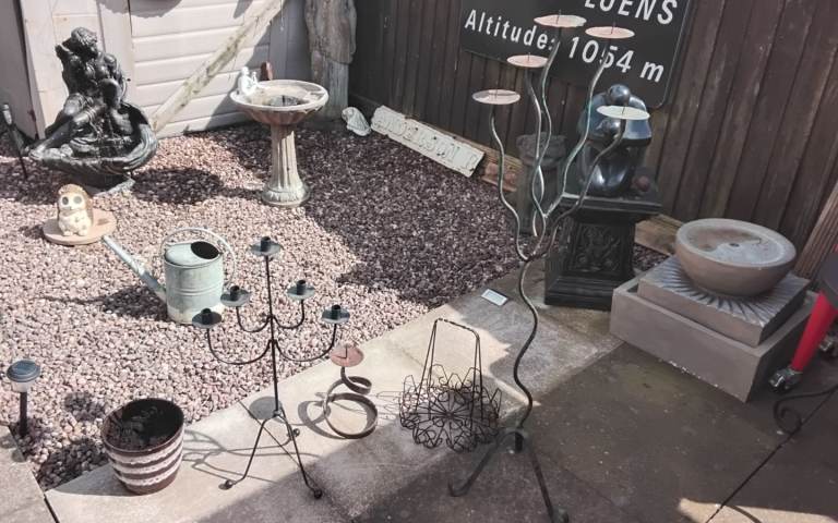 4 metal candlesticks from a garden clearance 
