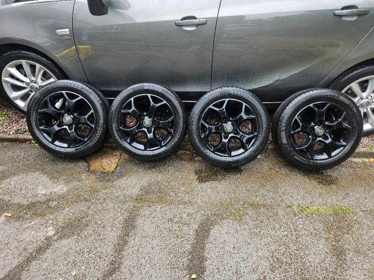 Vauxhall 16in alloy wheels and tyres pcd110 fitment 5 stud black  set 4 